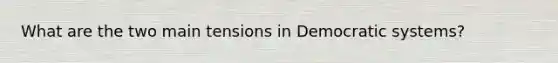What are the two main tensions in Democratic systems?