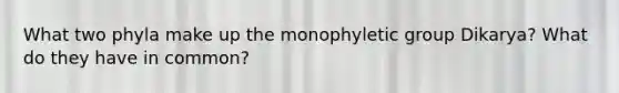 What two phyla make up the monophyletic group Dikarya? What do they have in common?