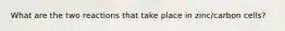 What are the two reactions that take place in zinc/carbon cells?