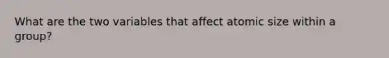 What are the two variables that affect atomic size within a group?