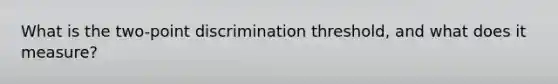 What is the two-point discrimination threshold, and what does it measure?