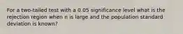 For a two-tailed test with a 0.05 significance level what is the rejection region when n is large and the population standard deviation is known?