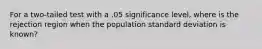 For a two-tailed test with a .05 significance level, where is the rejection region when the population standard deviation is known?