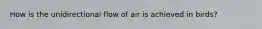 How is the unidirectional flow of air is achieved in birds?