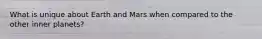 What is unique about Earth and Mars when compared to the other inner planets?