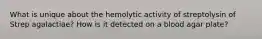 What is unique about the hemolytic activity of streptolysin of Strep agalactiae? How is it detected on a blood agar plate?