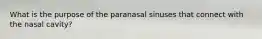 What is the purpose of the paranasal sinuses that connect with the nasal cavity?