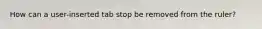 How can a user-inserted tab stop be removed from the ruler?
