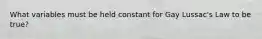 What variables must be held constant for Gay Lussac's Law to be true?