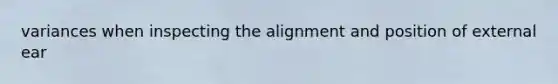 variances when inspecting the alignment and position of external ear