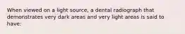 When viewed on a light source, a dental radiograph that demonstrates very dark areas and very light areas is said to have: