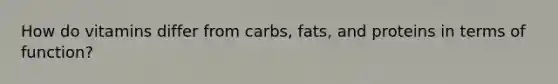 How do vitamins differ from carbs, fats, and proteins in terms of function?