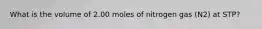 What is the volume of 2.00 moles of nitrogen gas (N2) at STP?