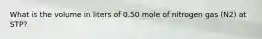 What is the volume in liters of 0.50 mole of nitrogen gas (N2) at STP?