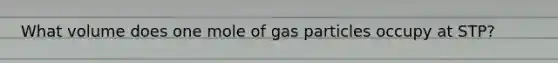 What volume does one mole of gas particles occupy at STP?