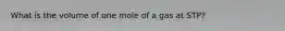 What is the volume of one mole of a gas at STP?