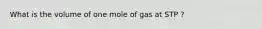 What is the volume of one mole of gas at STP ?