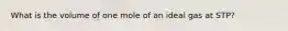 What is the volume of one mole of an ideal gas at STP?