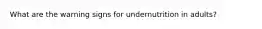 What are the warning signs for undernutrition in adults?