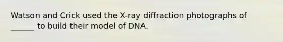 Watson and Crick used the X-ray diffraction photographs of ______ to build their model of DNA.