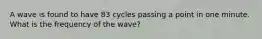 A wave is found to have 83 cycles passing a point in one minute. What is the frequency of the wave?