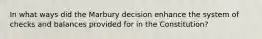 In what ways did the Marbury decision enhance the system of checks and balances provided for in the Constitution?