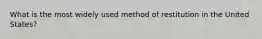 What is the most widely used method of restitution in the United States?