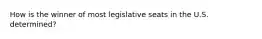 How is the winner of most legislative seats in the U.S. determined?