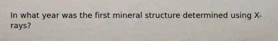 In what year was the first mineral structure determined using X-rays?