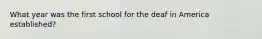 What year was the first school for the deaf in America established?