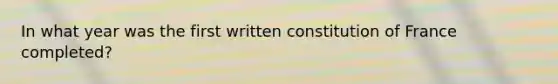 In what year was the first written constitution of France completed?