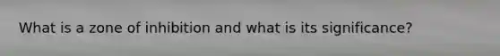 What is a zone of inhibition and what is its significance?